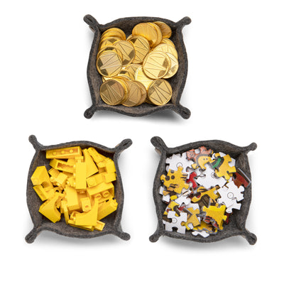 Top-Down View of 3 Taco Trays with Coins, Blocks, and Puzzle Pieces Inside